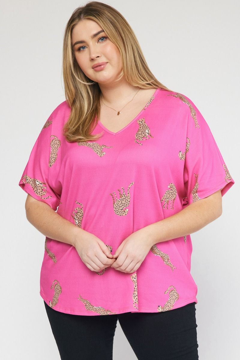 Cheetah print v-neck short sleeve top featuring drop shoulder. image 0