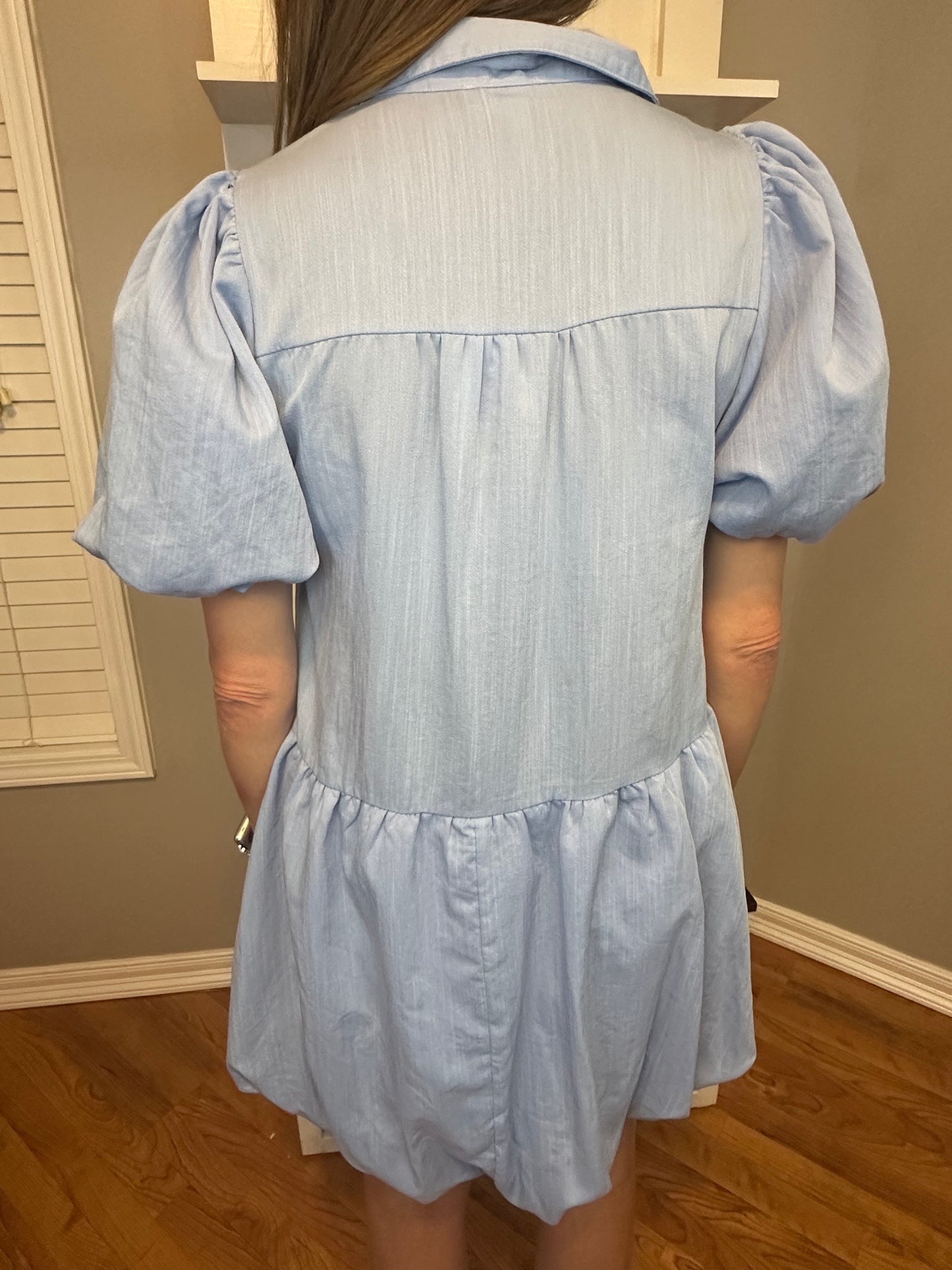 Chambray solid collared button up dress featuring bubble hem