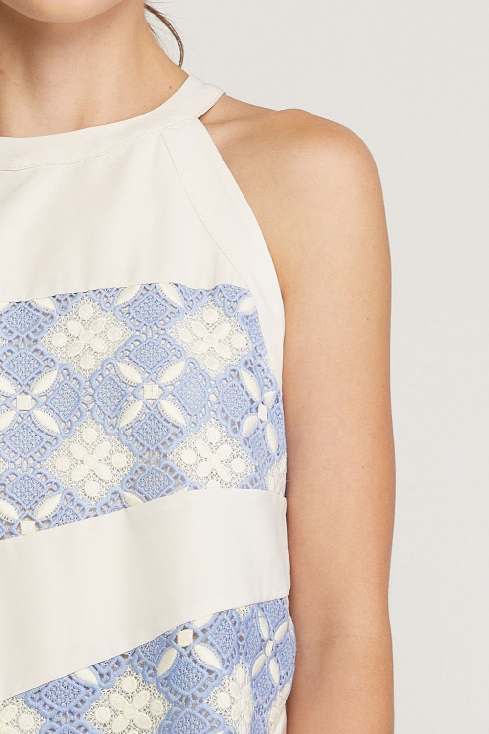 Solid halter neck sleeveless top featuring crochet detail at front. image 5