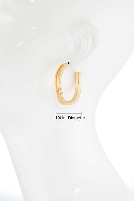 Gold oval hoop earrings image 2