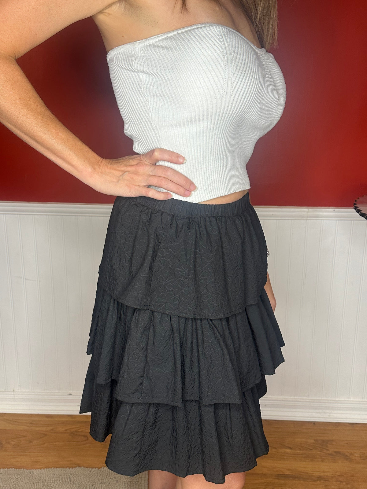 Black textured ruffle tiered mini skirt