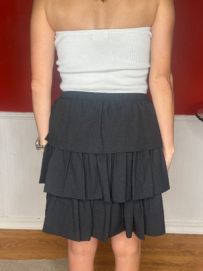 Black textured ruffle tiered mini skirt