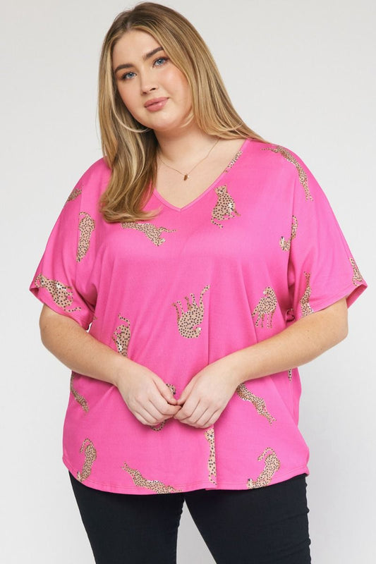 Cheetah print v-neck short sleeve top featuring drop shoulder. image 0