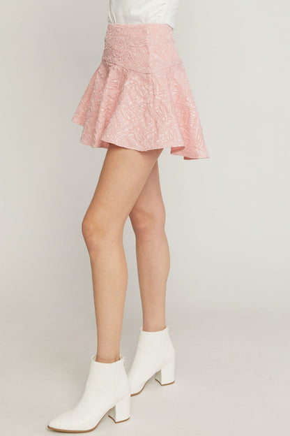 Pink solid textured flare mini skirt featuring inset shorts. image 1