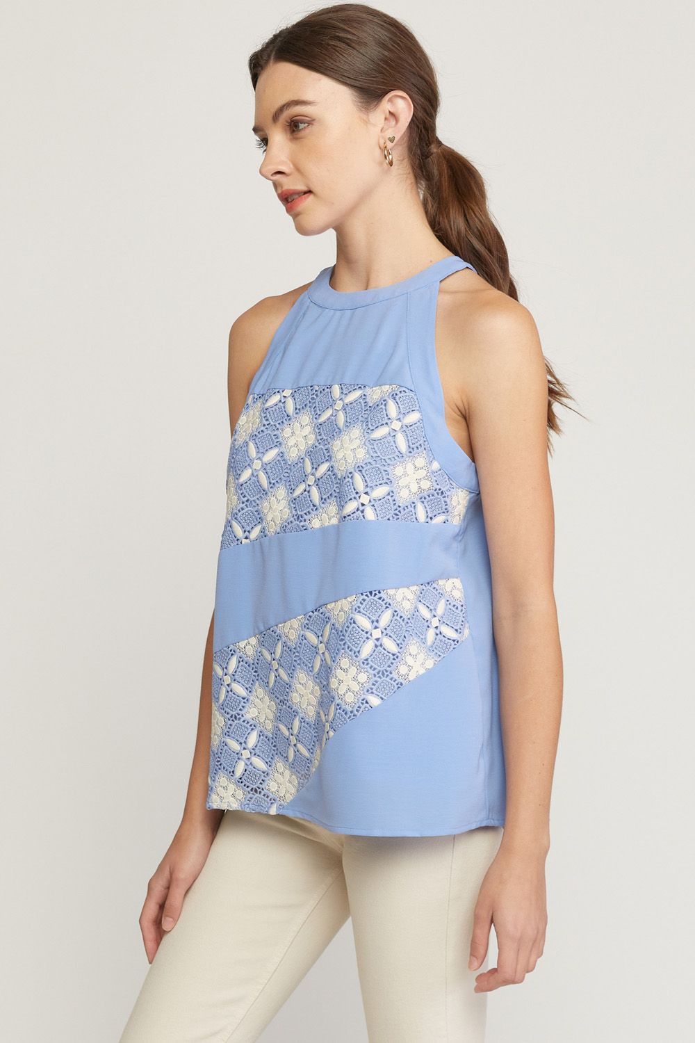 Periwinkle solid halter neck sleeveless top featuring crochet detail at front.  image 1