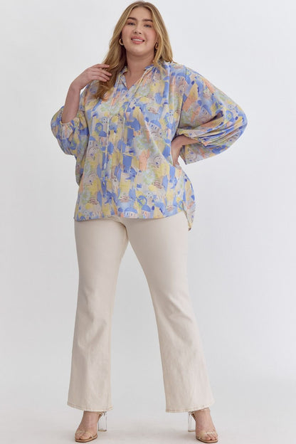 Blue multi printed v-neck 3/4 sleeve top featuring ruffle detail at neck.  image 4