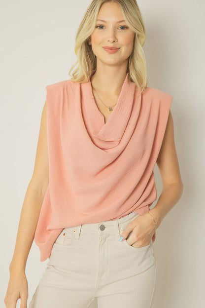 Salmon solid cowl neck sleeveless top featuring shoulder pads. Unlined. Woven. image 0