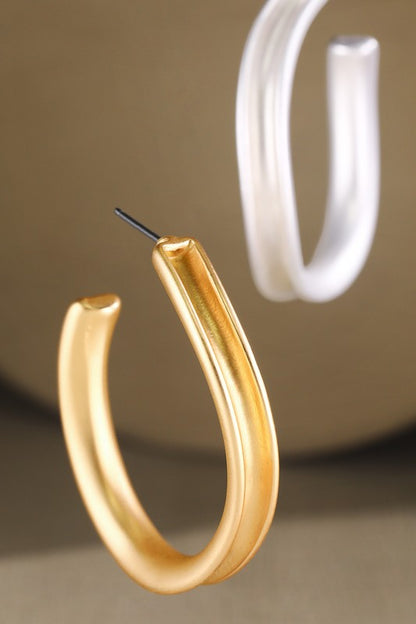 Gold oval hoop earrings image 1