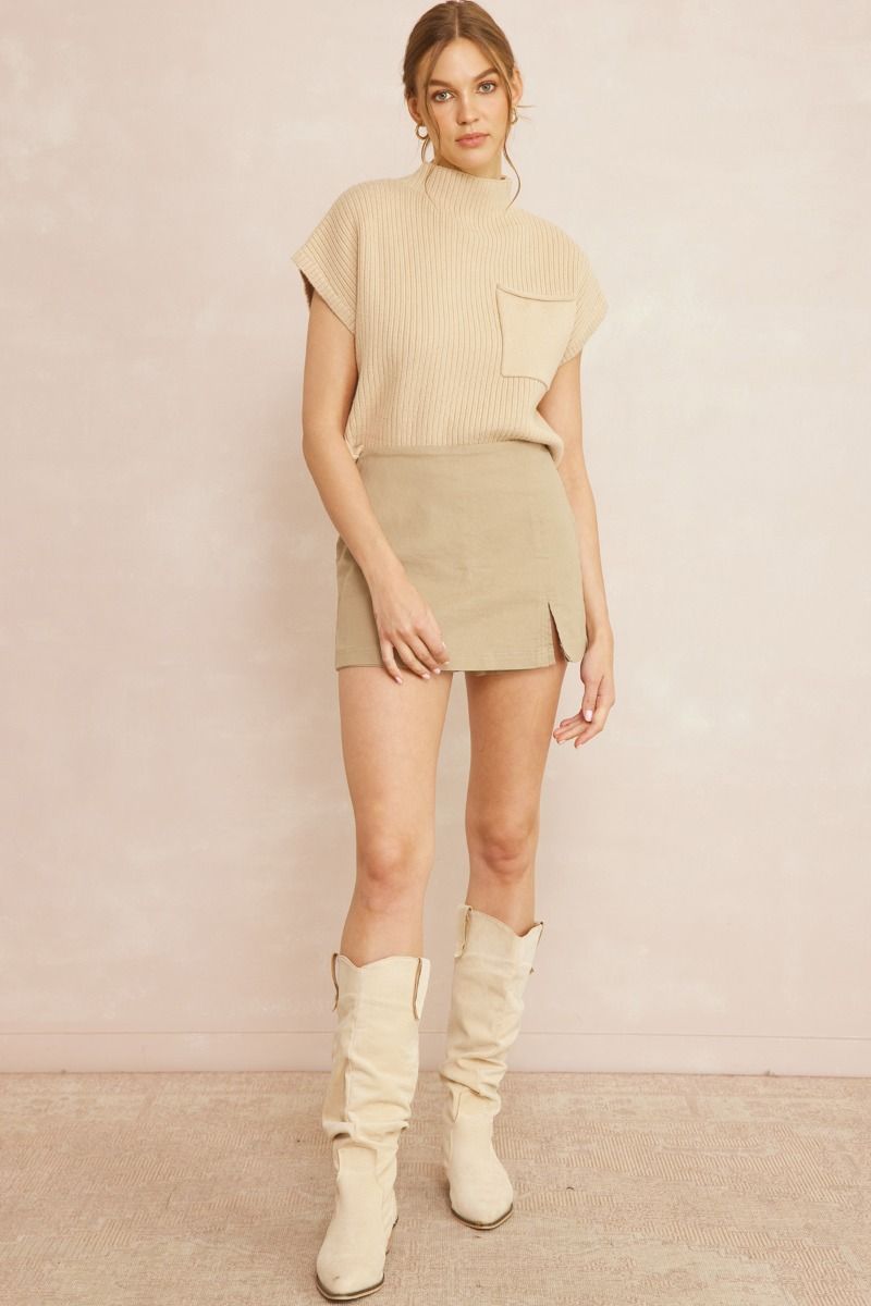 Solid knitted mock neck cropped top featuring single pocket detail. image 6