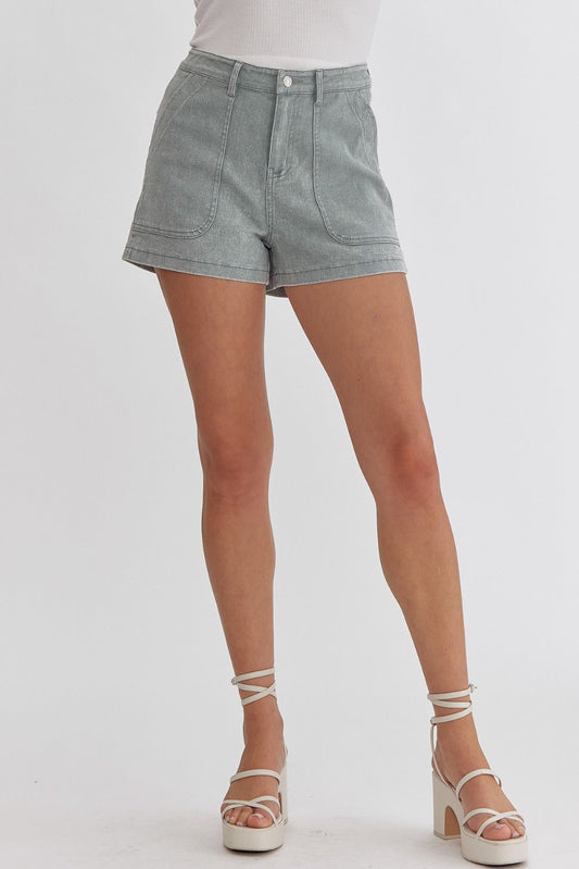 Sea foam Colored high waisted denim shorts featuring pockets at side.  image 0