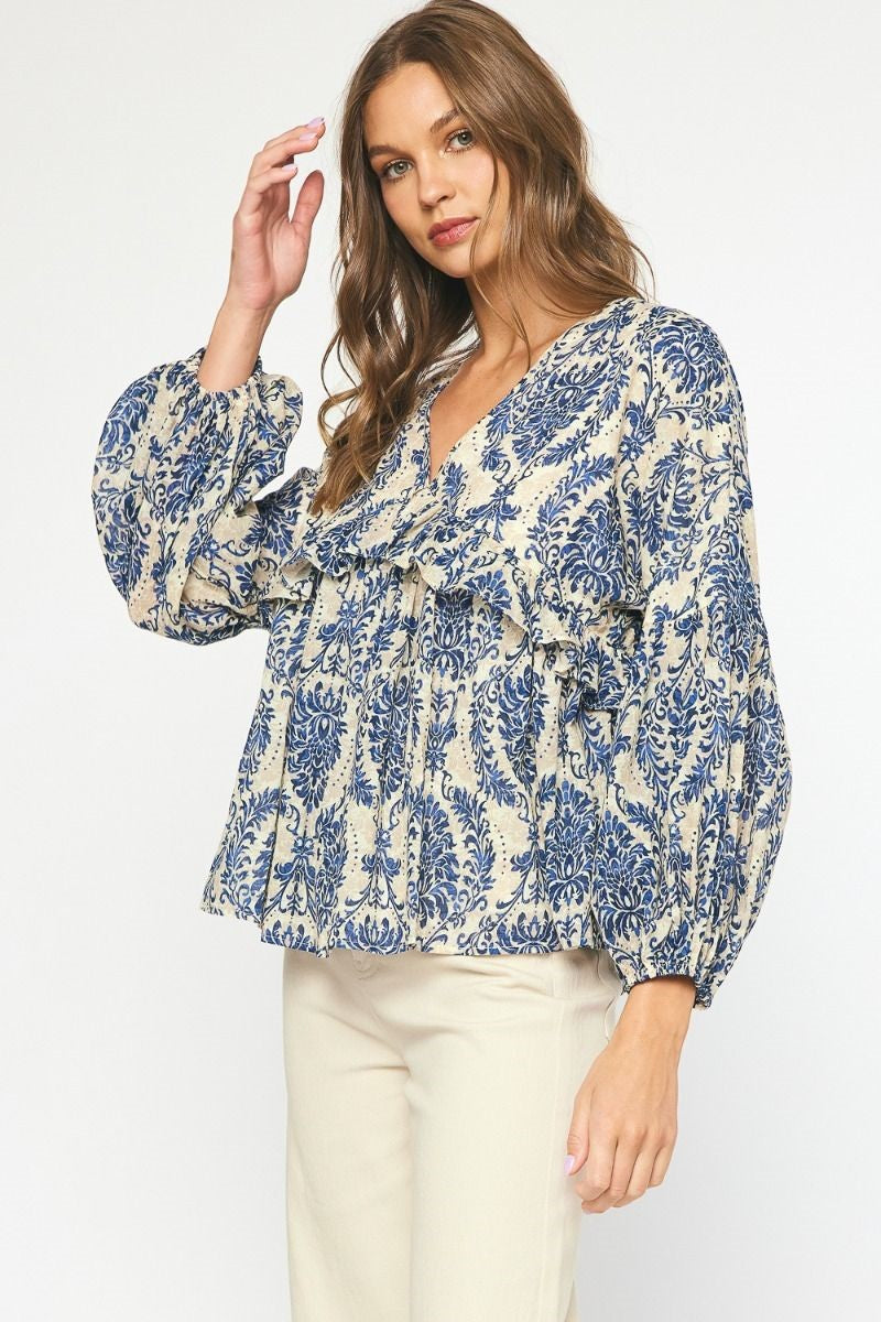 Midnight Blue Printed babydoll long sleeve top featuring ruffle detail. image 0