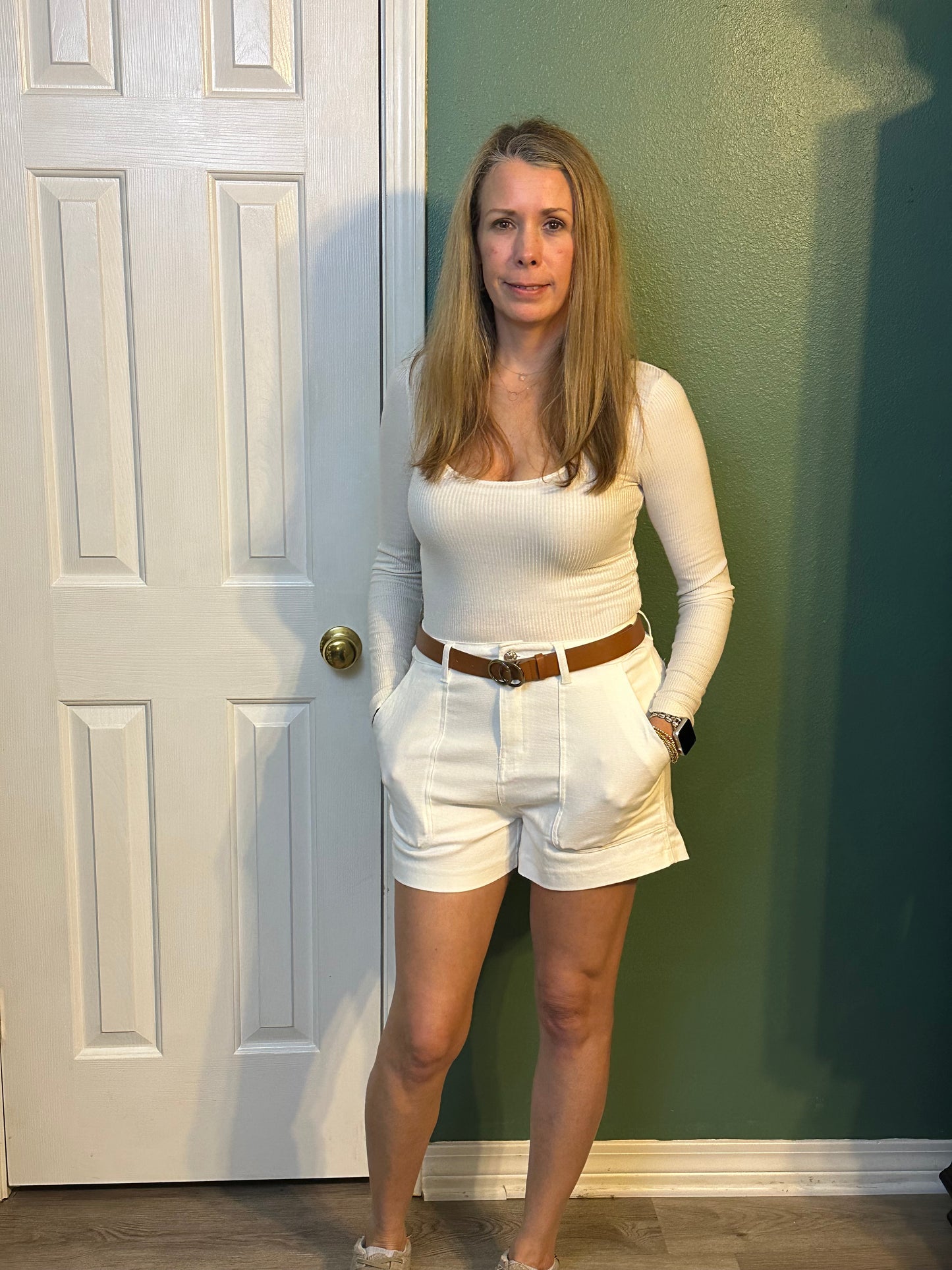 White colored high waisted denim shorts