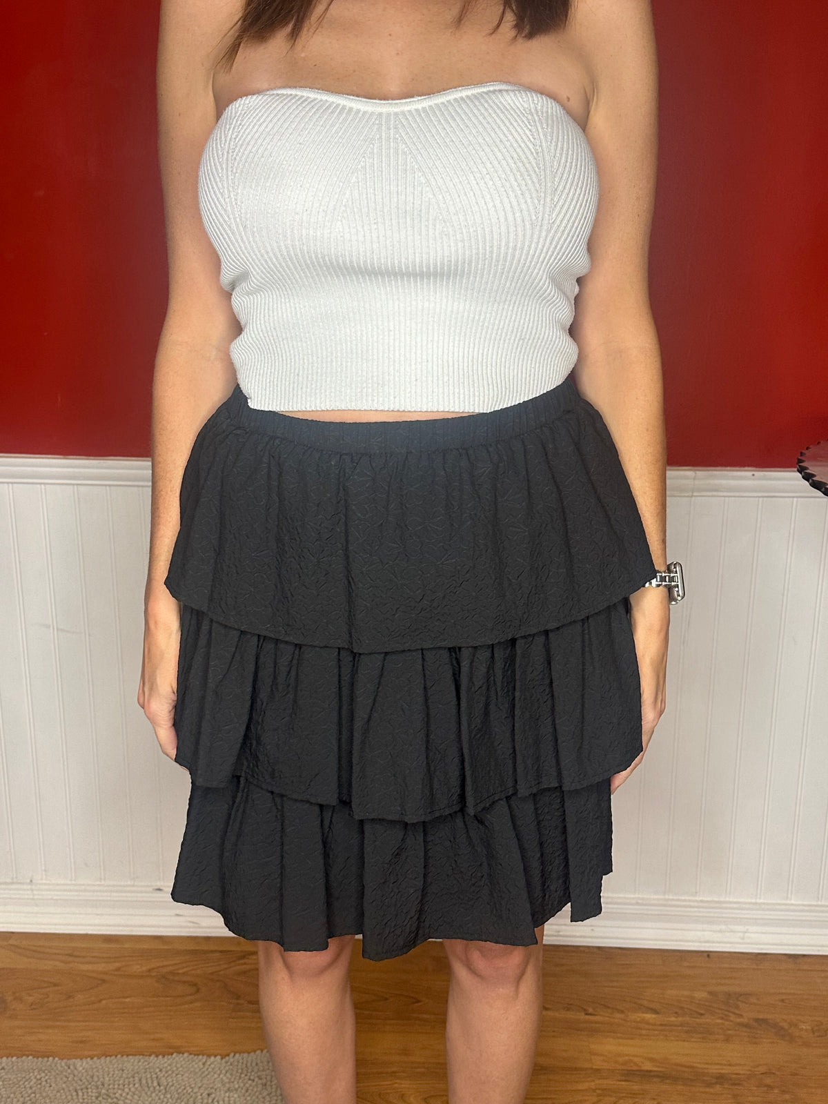 Black textured ruffle tiered mini skirt