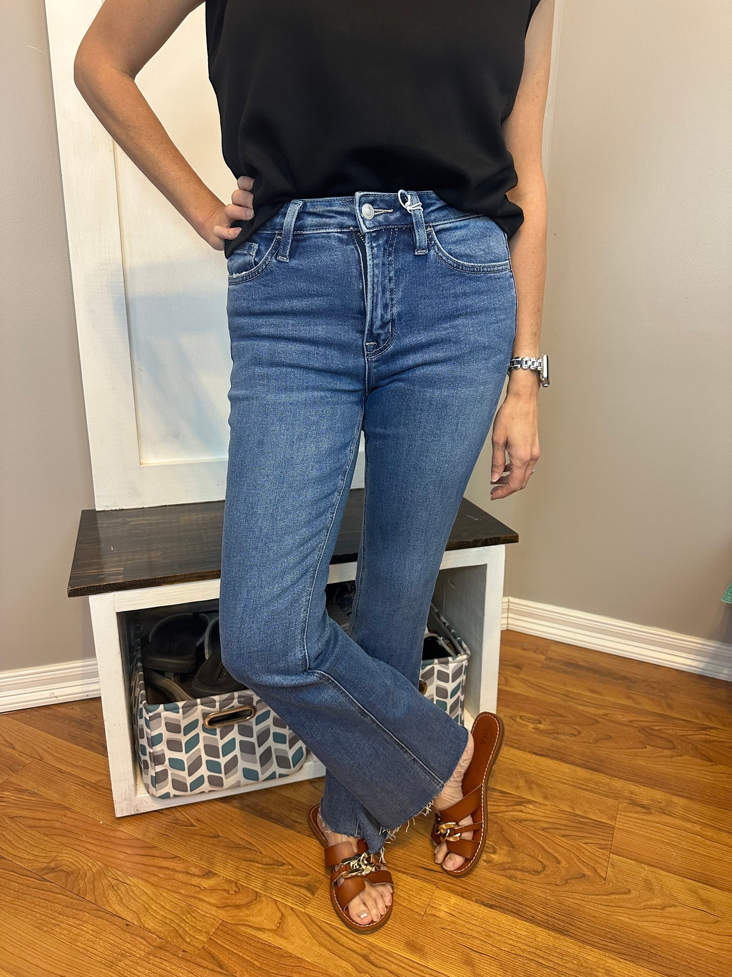 High rise clean cut raw hem bootcut jeans