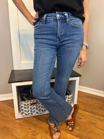 High rise clean cut raw hem bootcut jeans