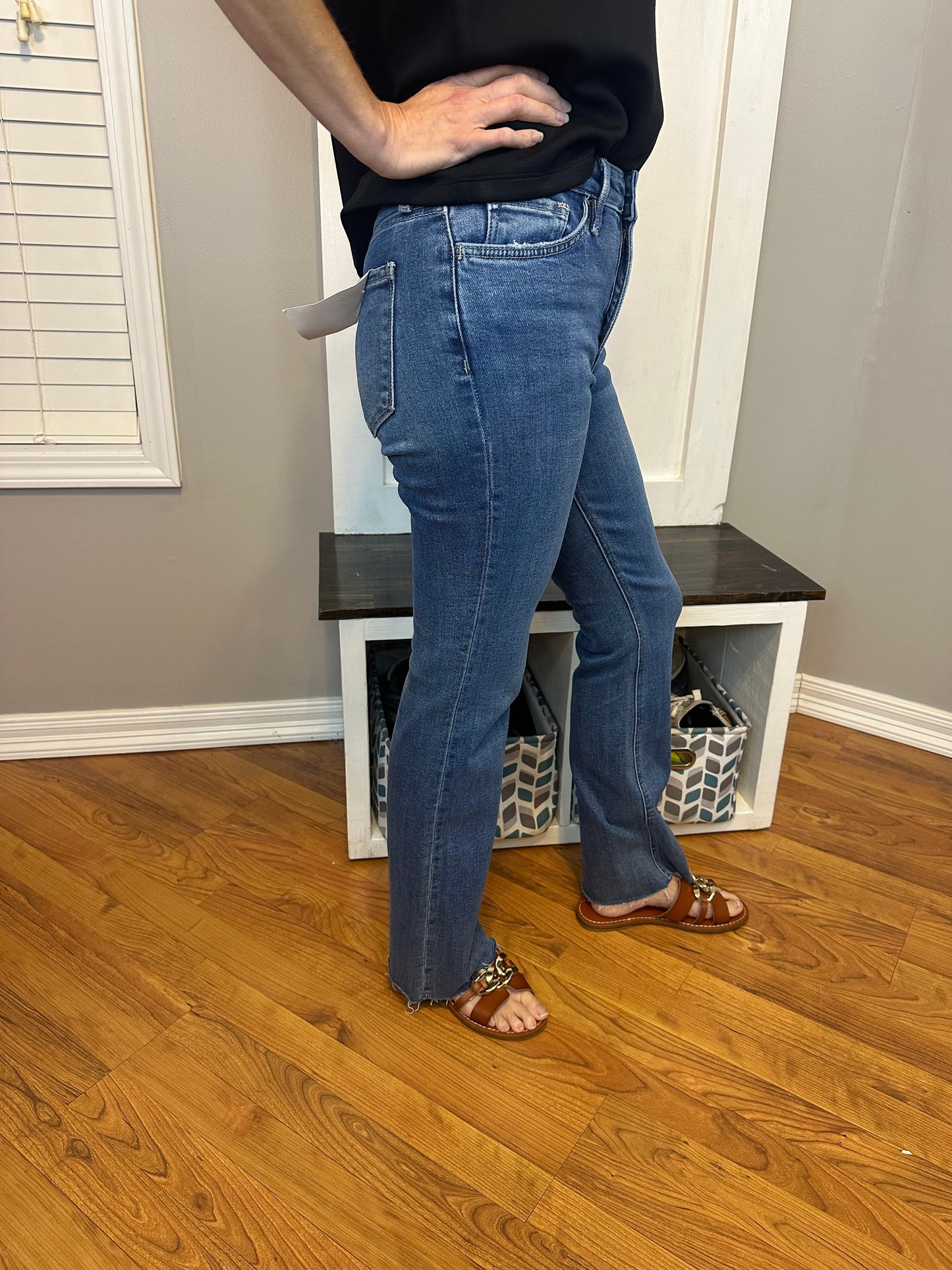 High rise clean cut raw hem bootcut jeans