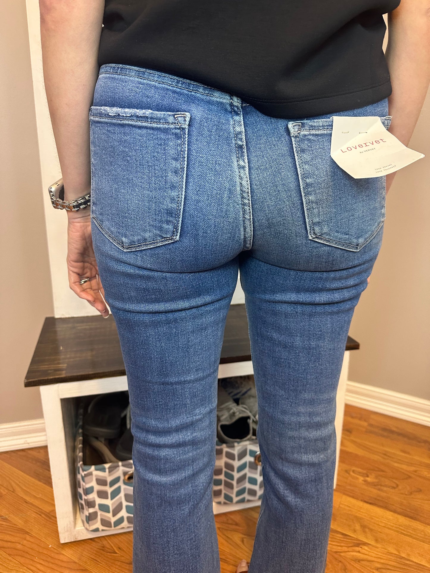 High rise clean cut raw hem bootcut jeans