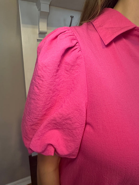 Hot pink solid collared button up dress featuring bubble hem and sleeves.