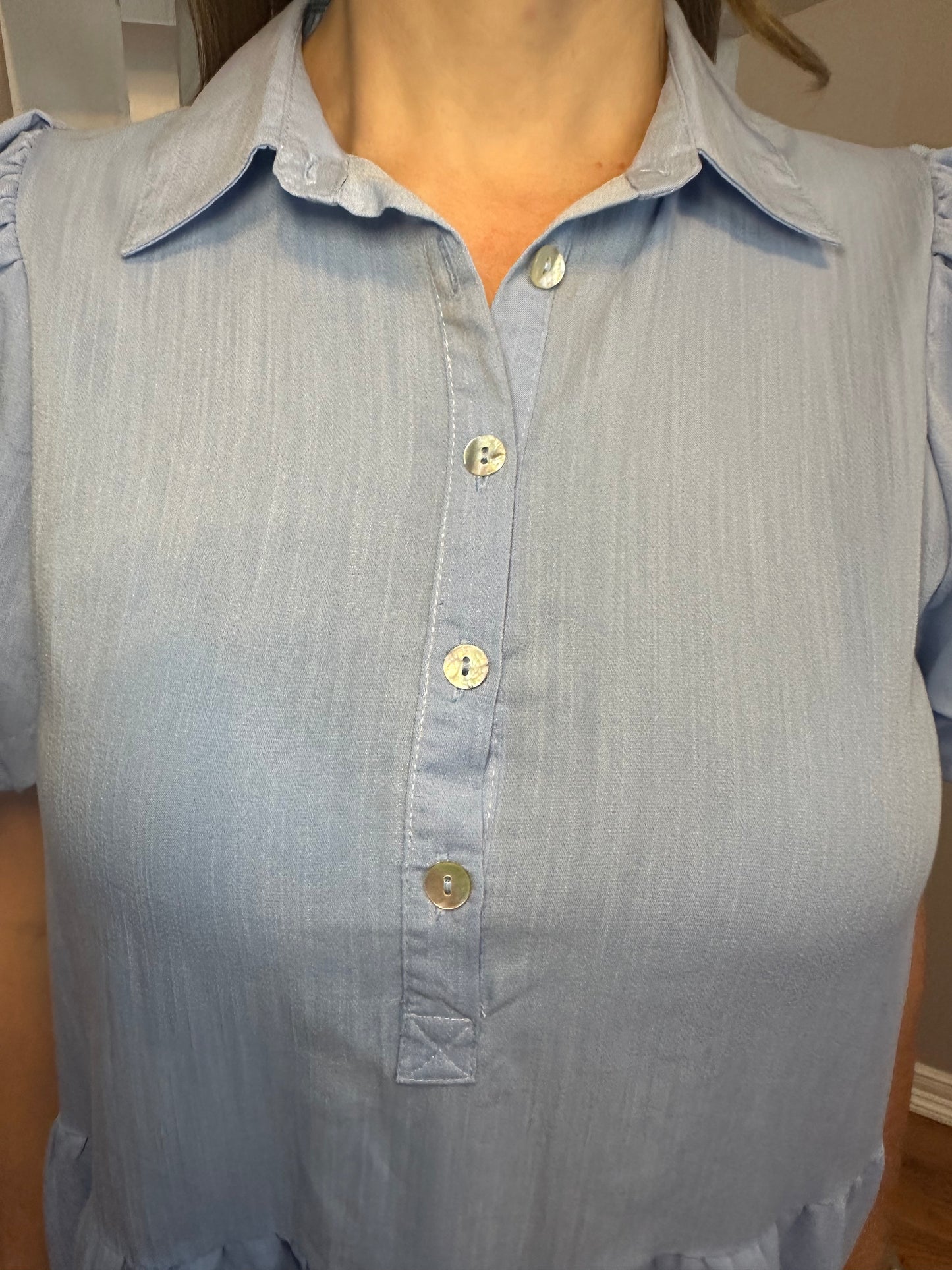 Chambray solid collared button up dress featuring bubble hem