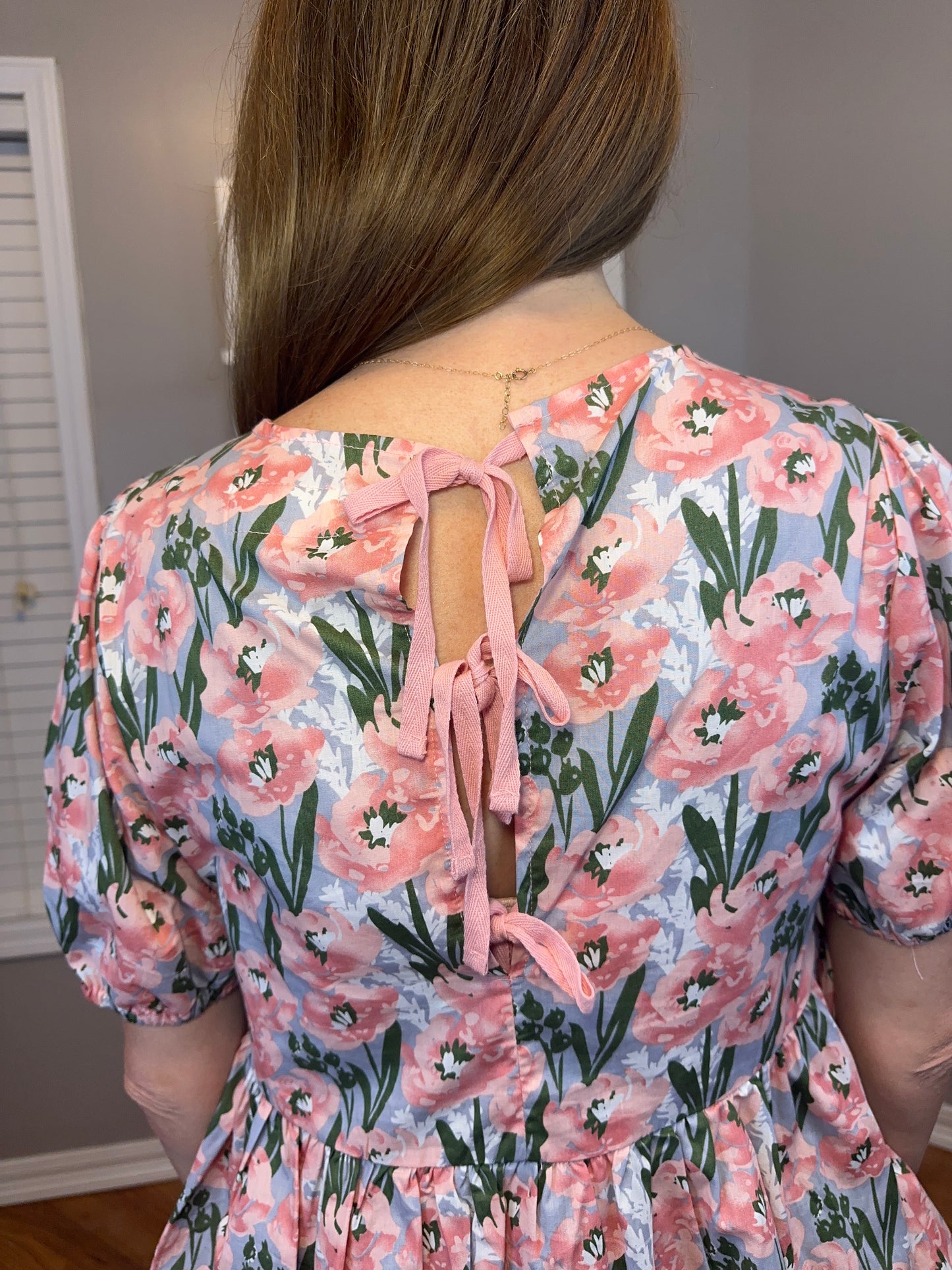 Floral Print Peplum Top with Back Ribbon Details