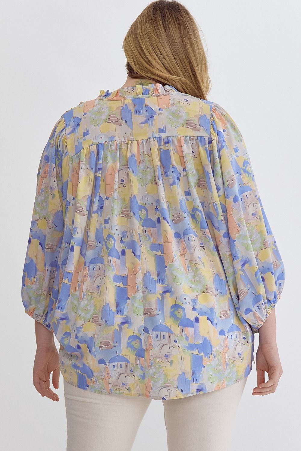 Blue multi printed v-neck 3/4 sleeve top featuring ruffle detail at neck.  image 3