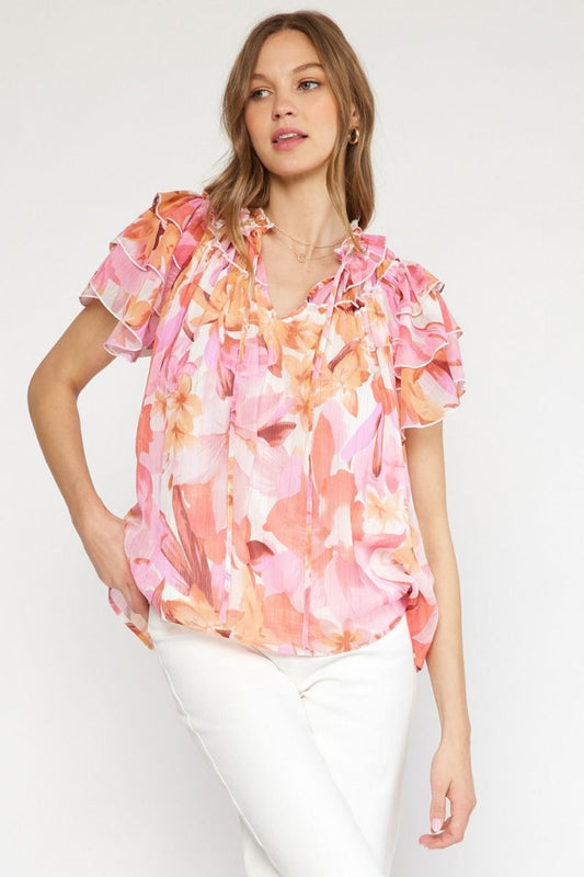 Floral print v-neck ruffle sleeve top featuring self tie at front neck. image 0