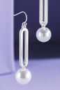Silver pearl oval metal fishhook earrings image 0