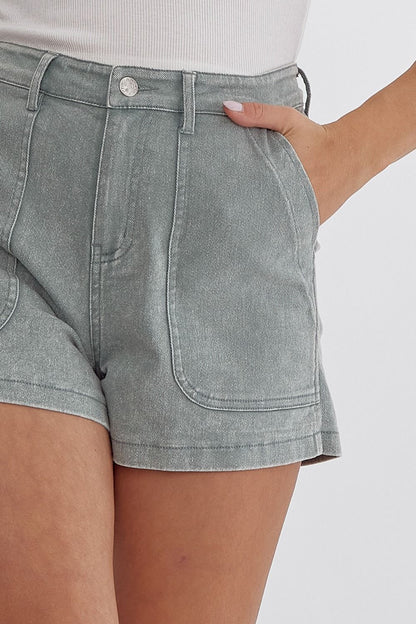 Sea foam Colored high waisted denim shorts featuring pockets at side.  image 5