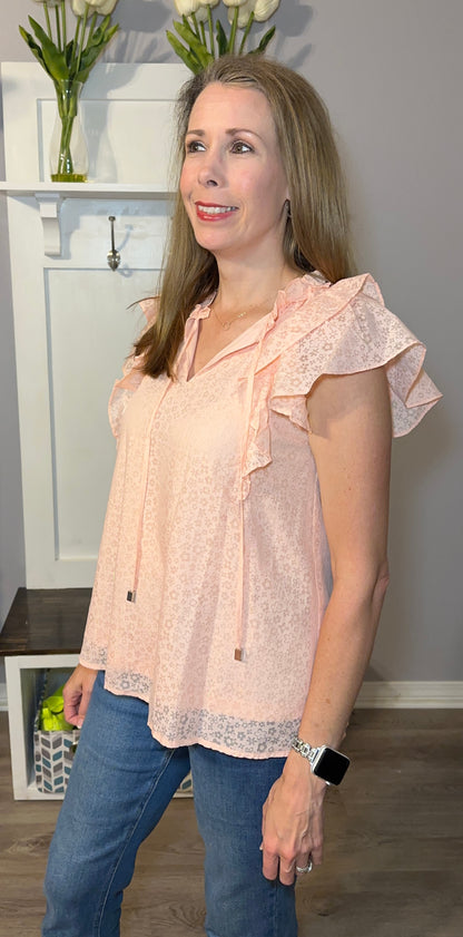 Peach colored floral print ruffle sleeve top   image 1