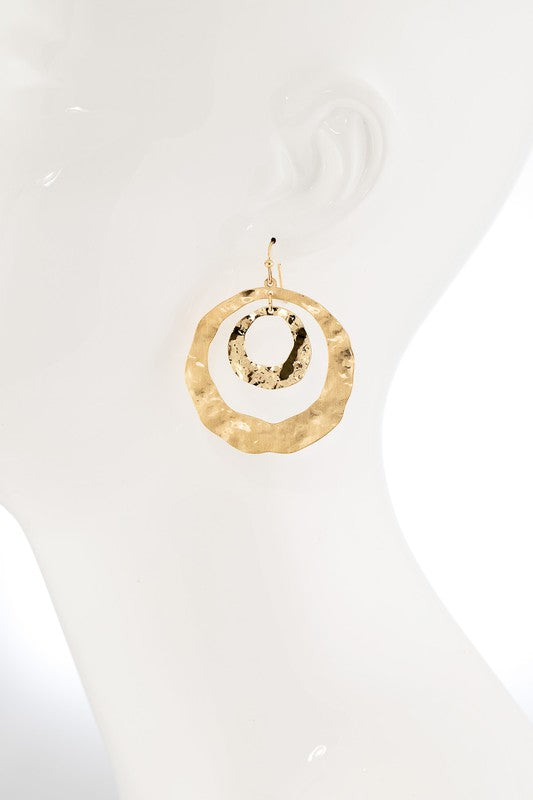 Gold Hammered steel hoop earring  image 1