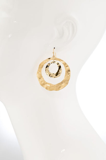 Gold Hammered steel hoop earring  image 1