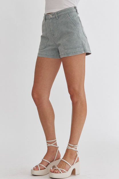 Sea foam Colored high waisted denim shorts featuring pockets at side.  image 1