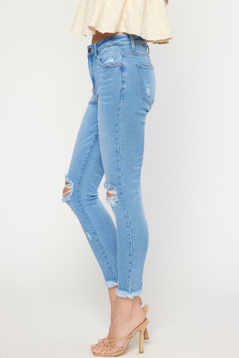 Light colored washed denim skinny jeans image 2