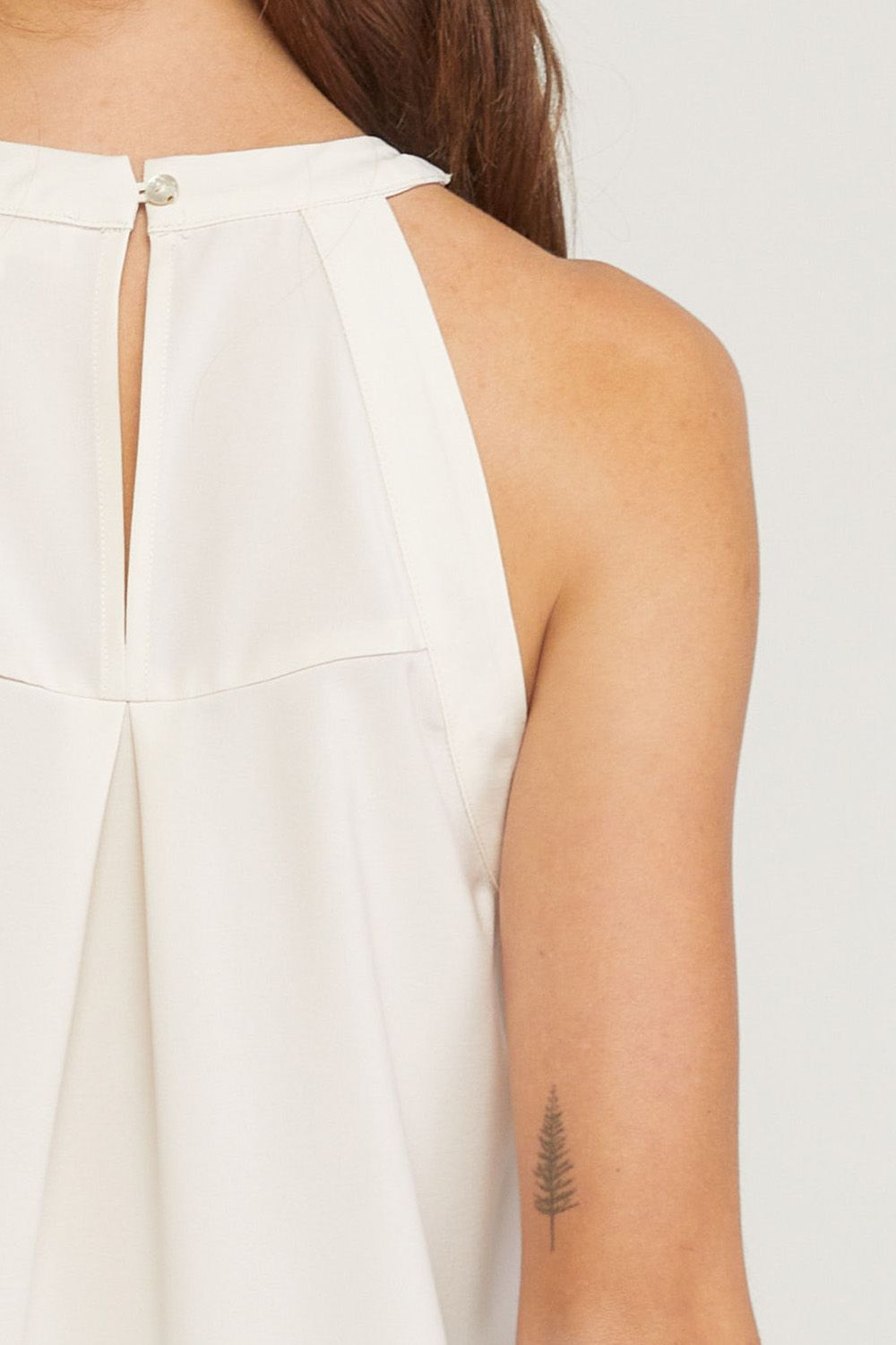 Solid halter neck sleeveless top featuring crochet detail at front. image 6
