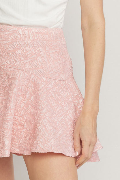 Pink solid textured flare mini skirt featuring inset shorts. image 5