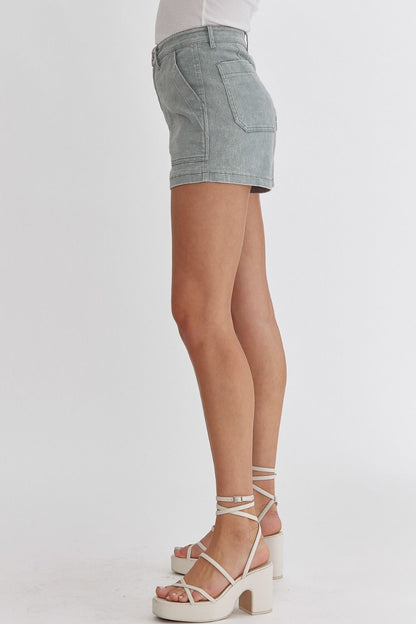 Sea foam Colored high waisted denim shorts featuring pockets at side.  image 2