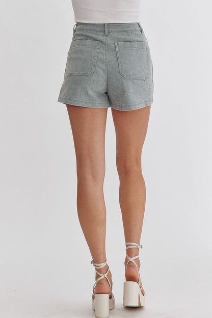 Sea foam Colored high waisted denim shorts featuring pockets at side.  image 3